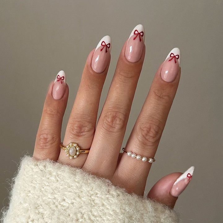 Artificial nail set with playful bow design Stornfield