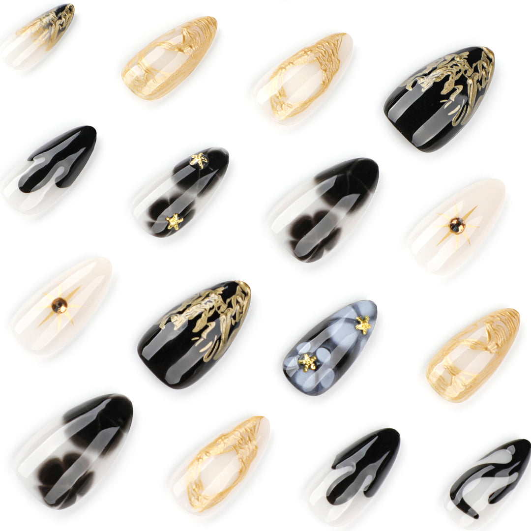 Elegant Stiletto Artificial Nails with Gold Accents and Modern Designs Stornfield