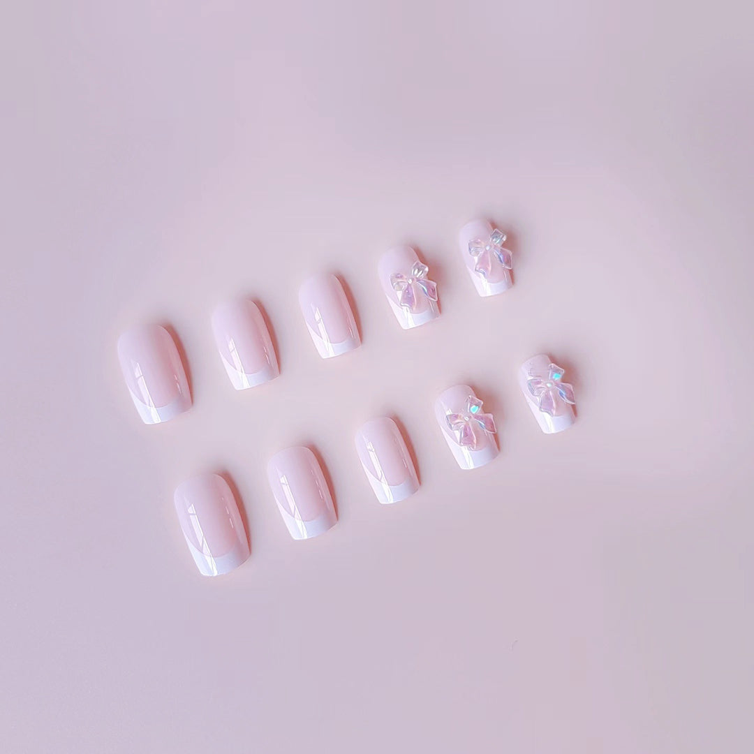 Acrylic nail set with elegant French tips and 3D details Stornfield