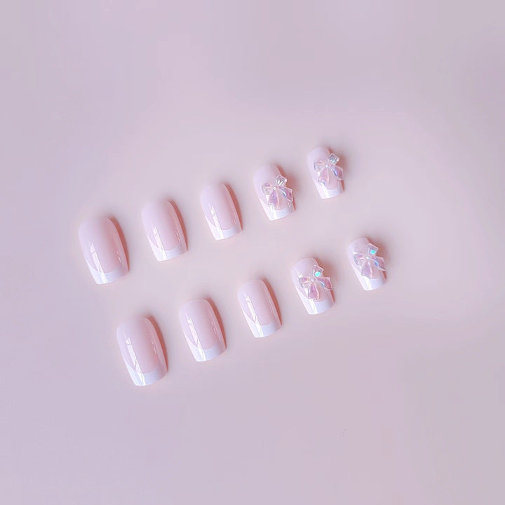 Acrylic nail set with elegant French tips and 3D details Stornfield
