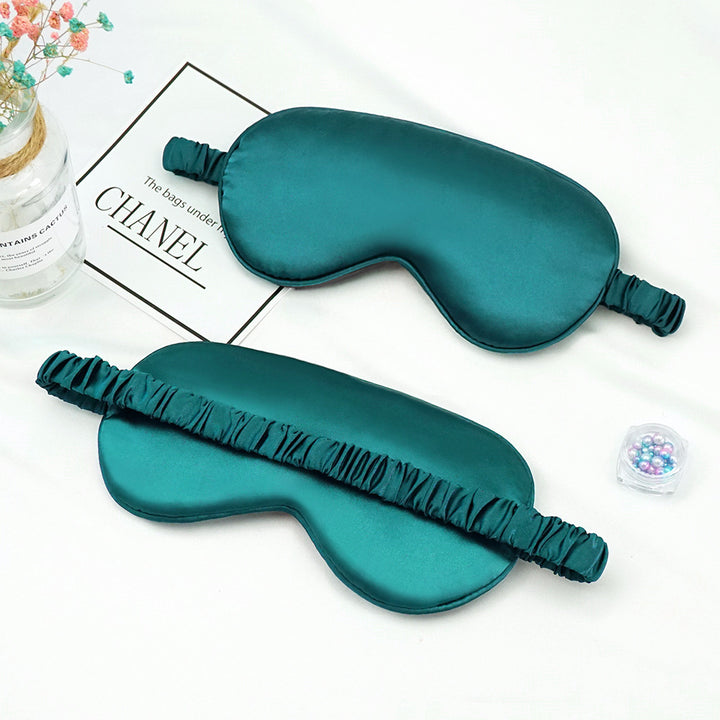 Women's breathable satin eye mask with ergonomic curvature, soft padding and gathered anti-slip band Stornfield
