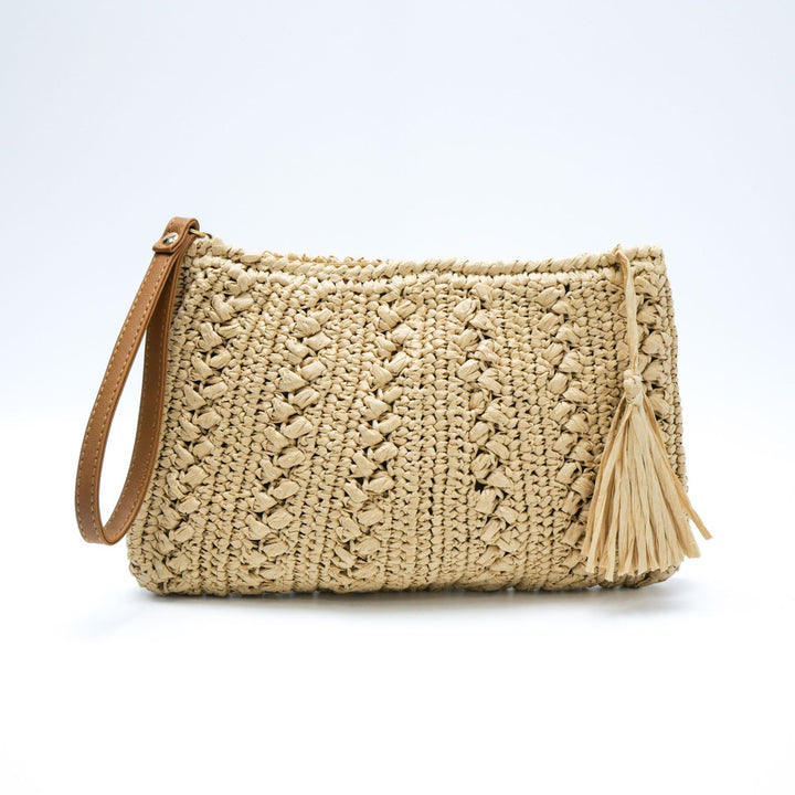 Woven natural material handbag with tassel Stornfield