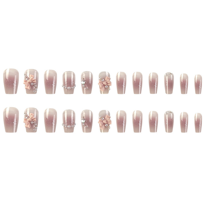 Glamorous artificial nails with moon and star motif Stornfield