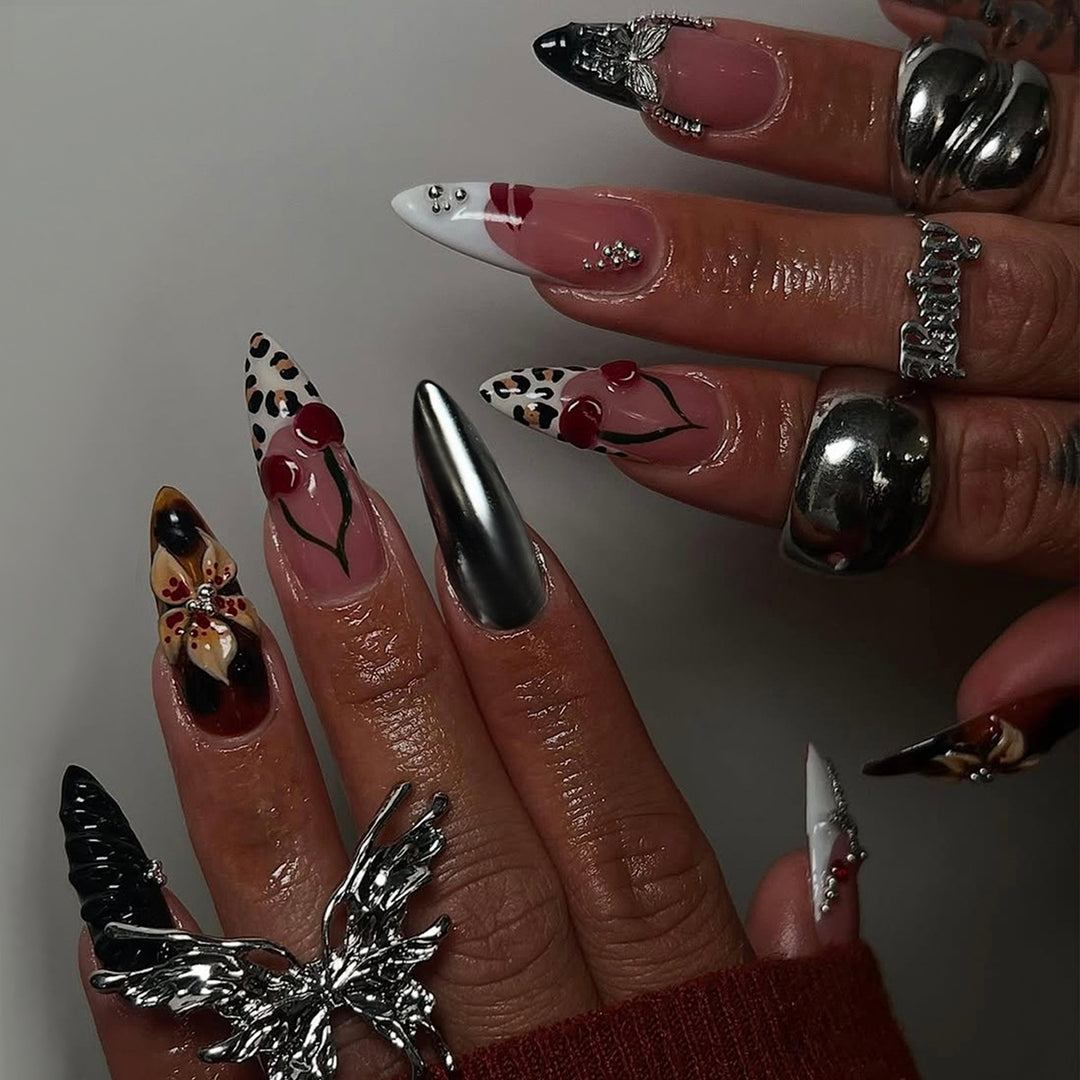 Artful Stiletto Fingernails with Unique Design Elements Stornfield