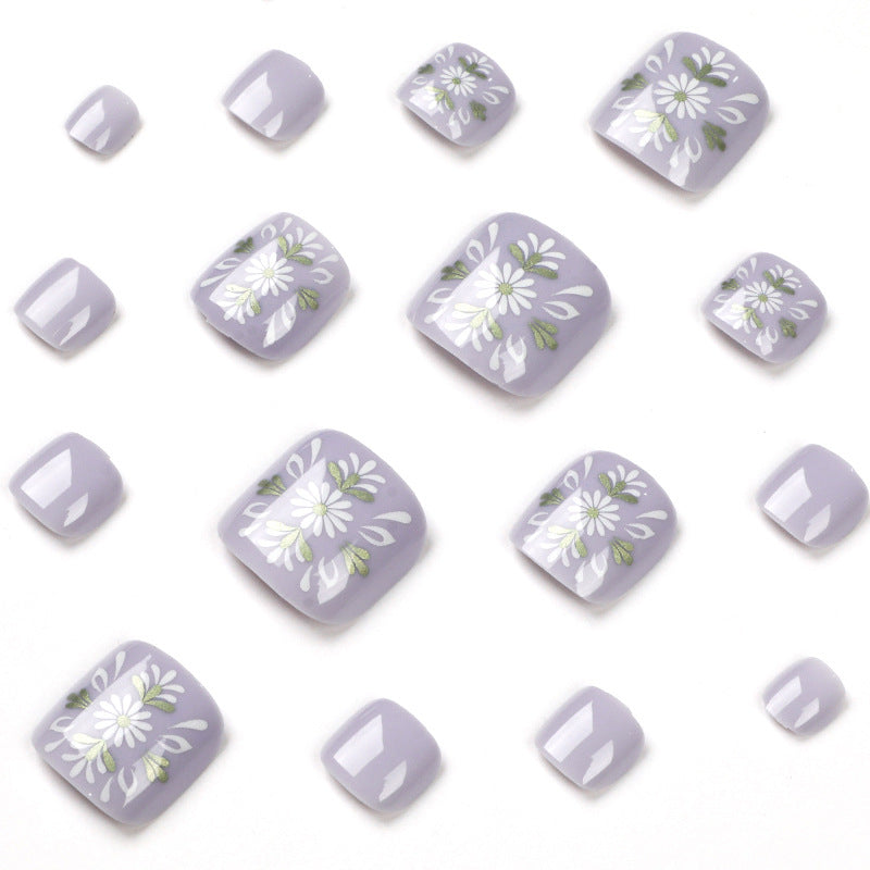 Artistic toenail design with elegant floral design Stornfield