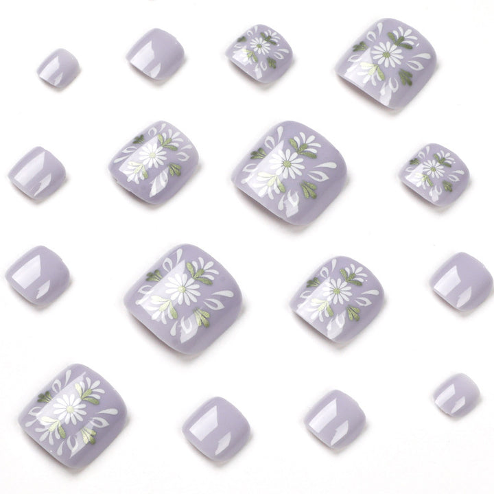 Artistic toenail design with elegant floral design Stornfield