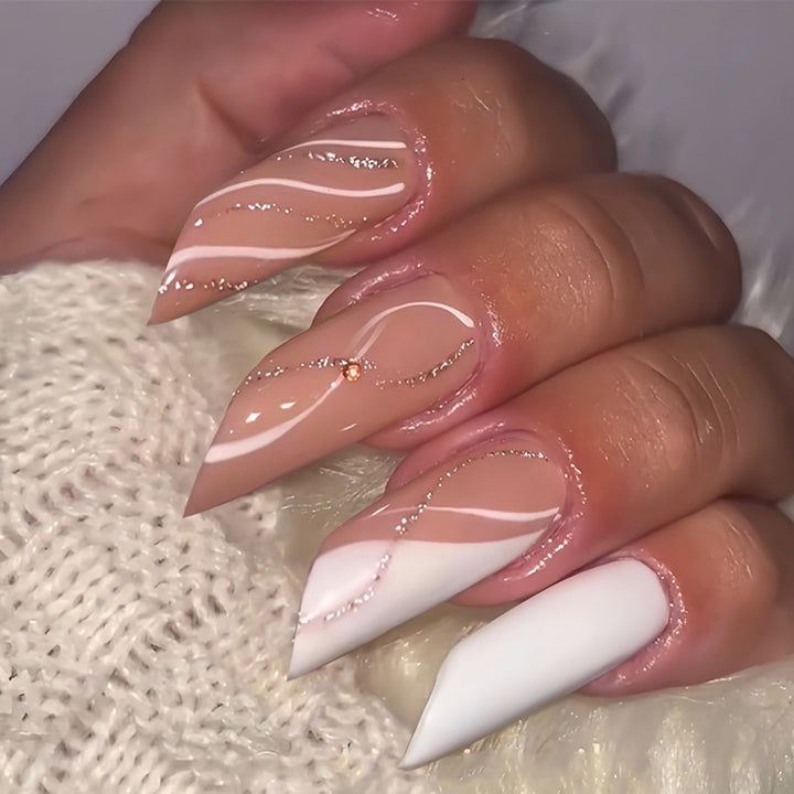 Acrylic nail set with elegant wave patterns and glitter accents Stornfield