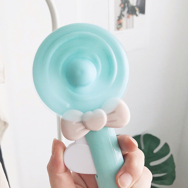 Portable hand fan for women in lollipop design Stornfield