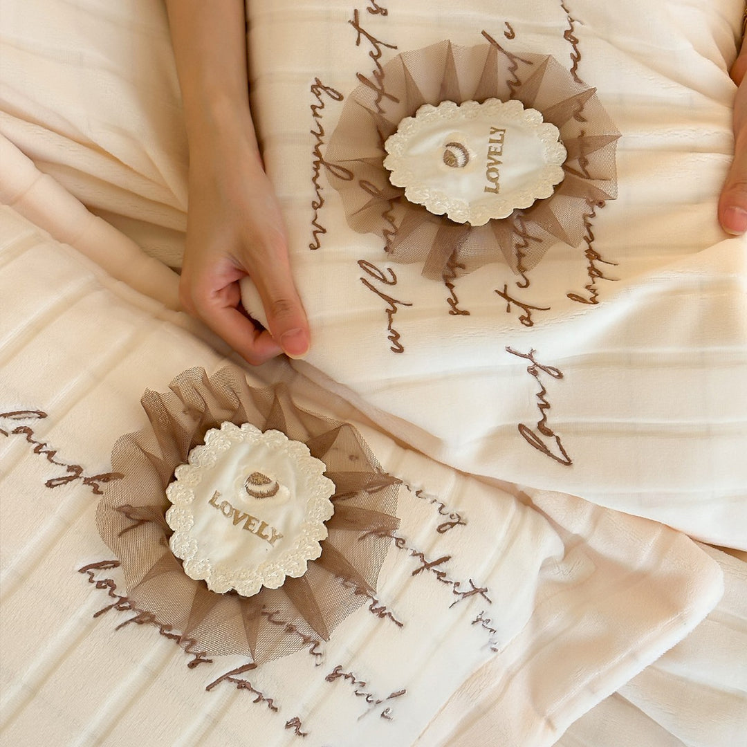 Quilted Sateen Duvet Cover Bedding Set with Appliqué Rosette & Embroidered Script