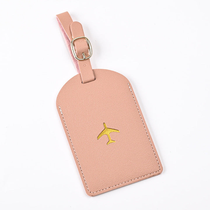 premium leather luggage tag with adjustable buckle strap and embossed airplane Stornfield