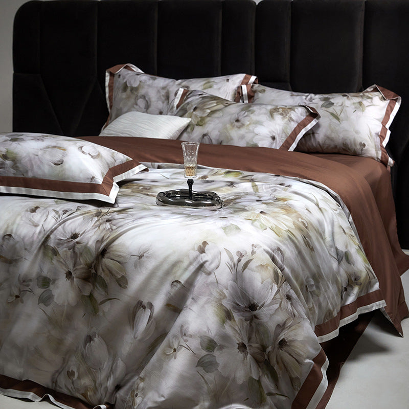 Fine woven satin bedding set with watercolor floral print, satin edge & hotel closure
