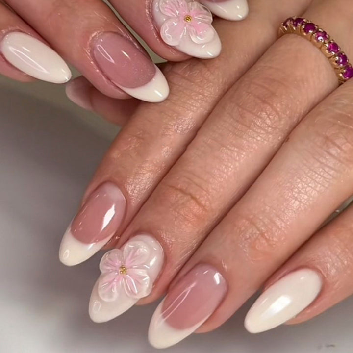 Artificial nails with flower accents and French tip Stornfield