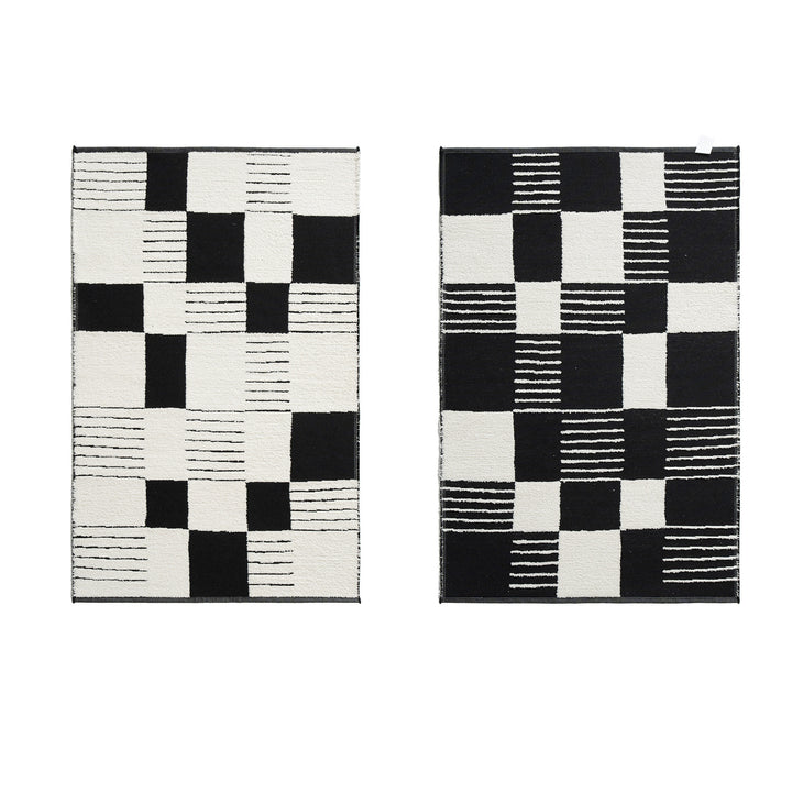 Modern runner rug with graphic checkerboard pattern and short pile structure Stornfield