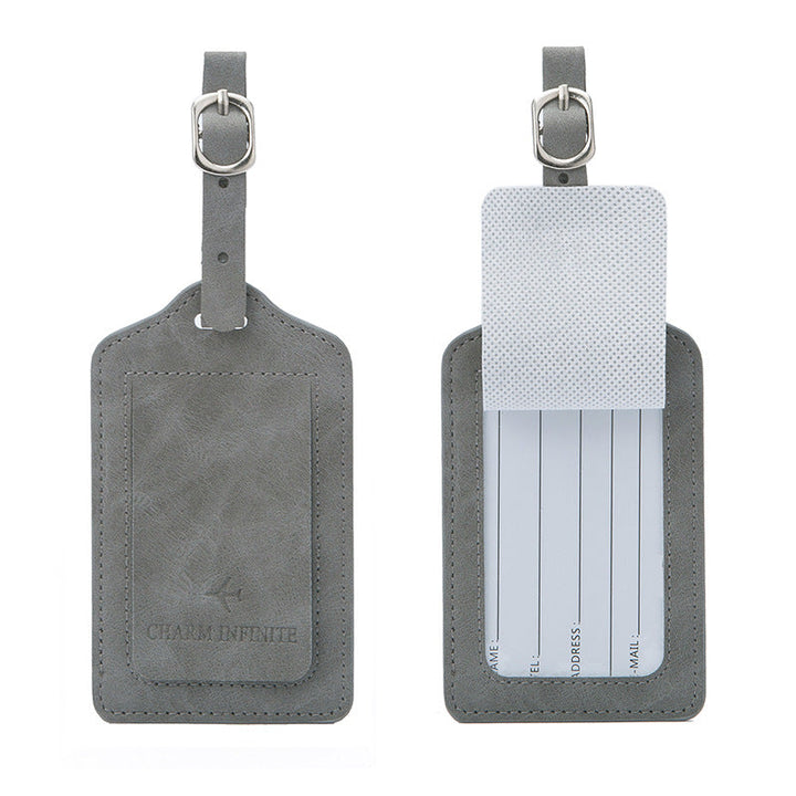 vintage leather luggage tag with transparent ID window and adjustable buckle strap Stornfield