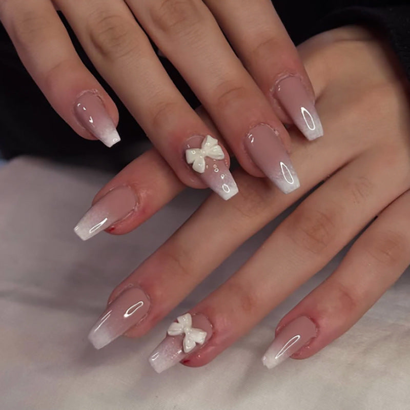 Artful acrylic nails with elegant butterfly design Stornfield