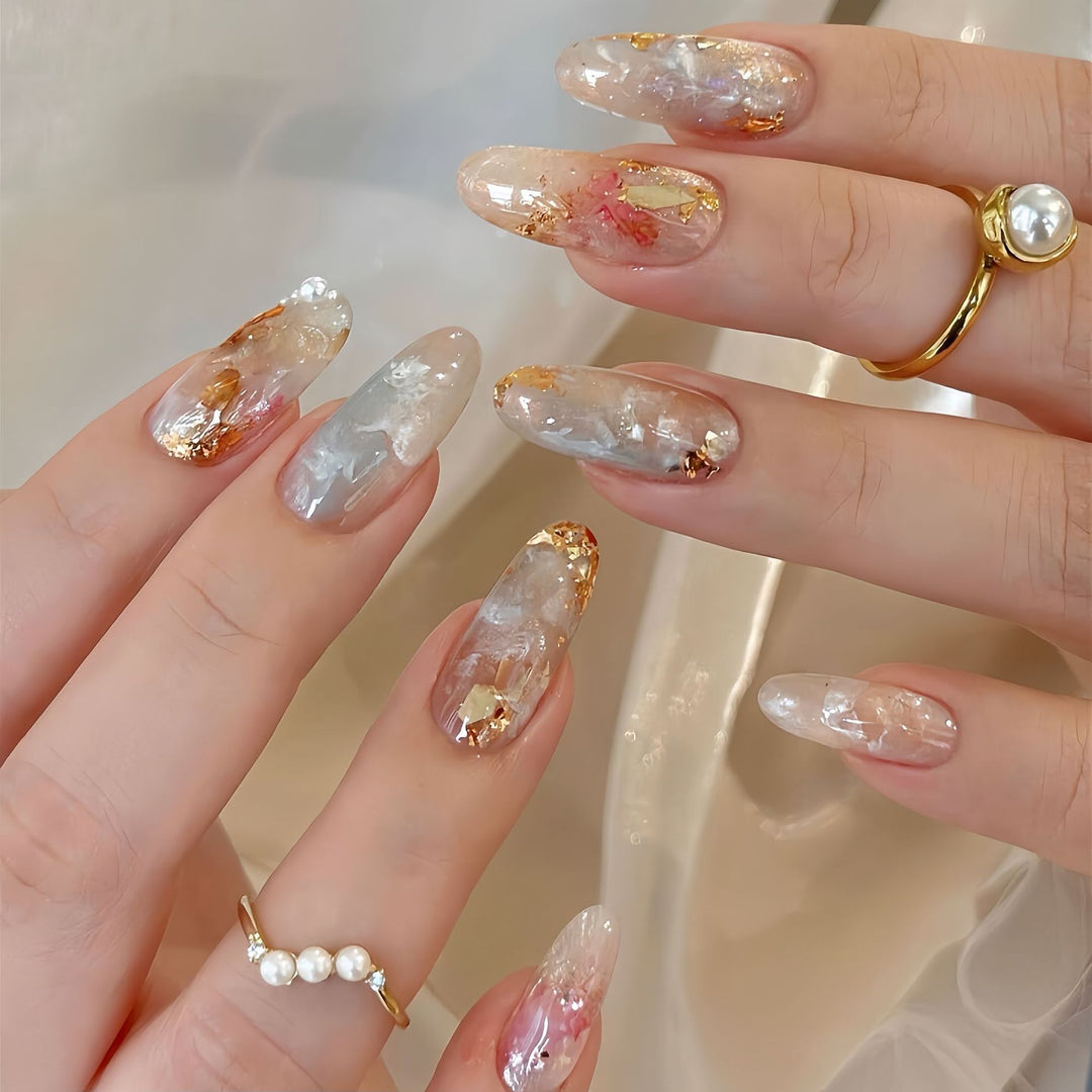 Artificial nails with glamorous metallic details and sparkling design Stornfield