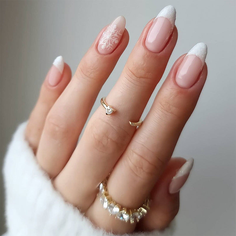 Artful stiletto nails with heart-shaped accents Stornfield