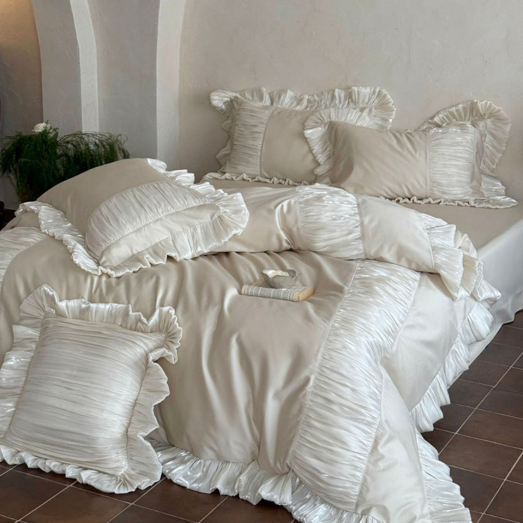 Romantic satin bedding set with ruffles and pleated inserts