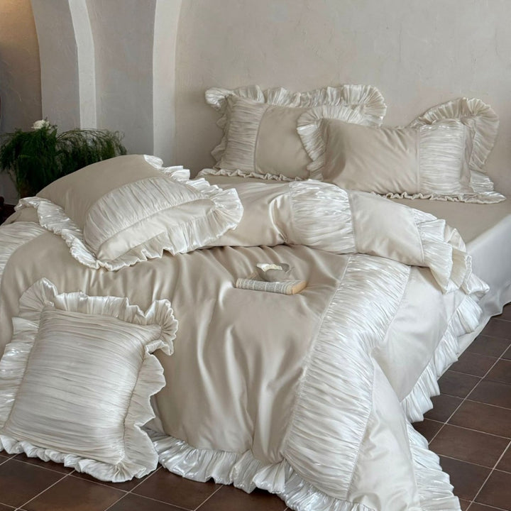 Romantic satin bedding set with ruffles and pleated inserts