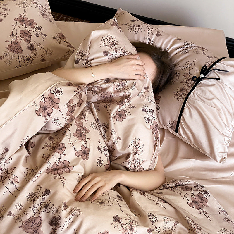 Luxurious satin bedding set with floral print and ruffles