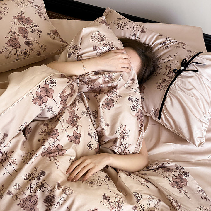 Luxurious satin bedding set with floral print and ruffles