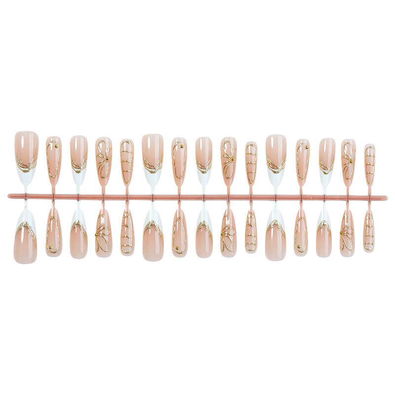 Nail art set with filigree gold accents Stornfield