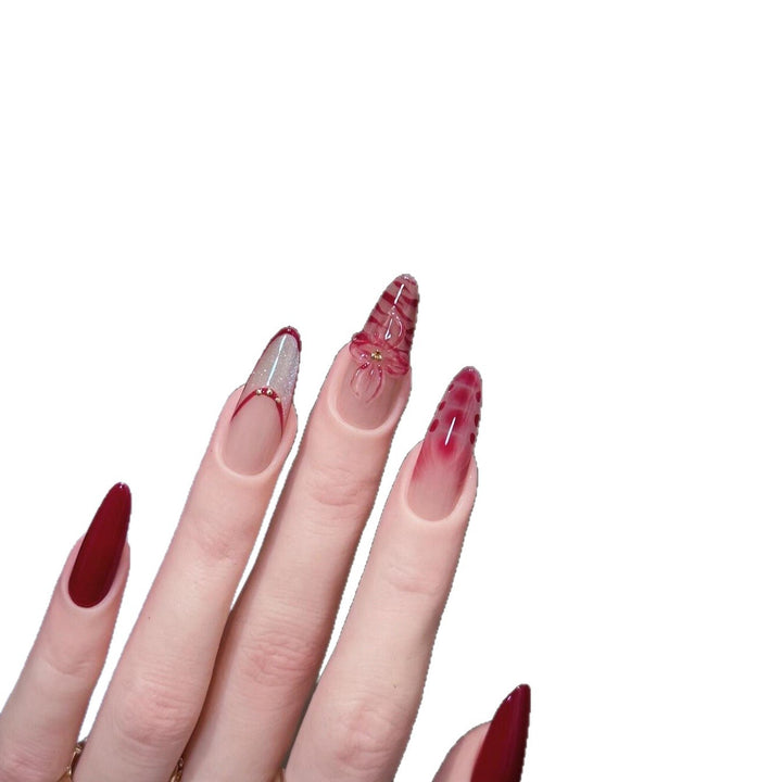 Artificial nails with floral and glamour details Stornfield