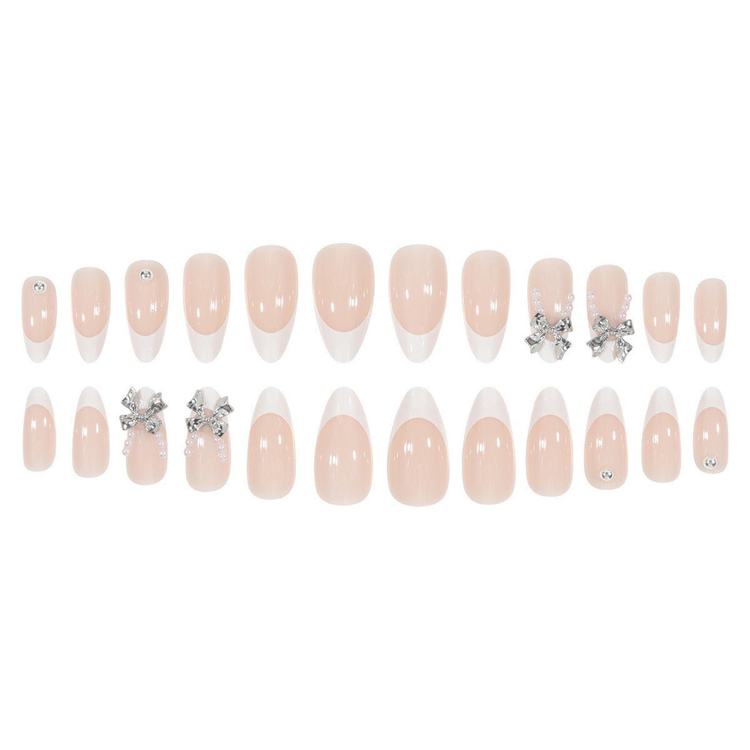 Glamorous artificial nail tips with elegant decorations Stornfield