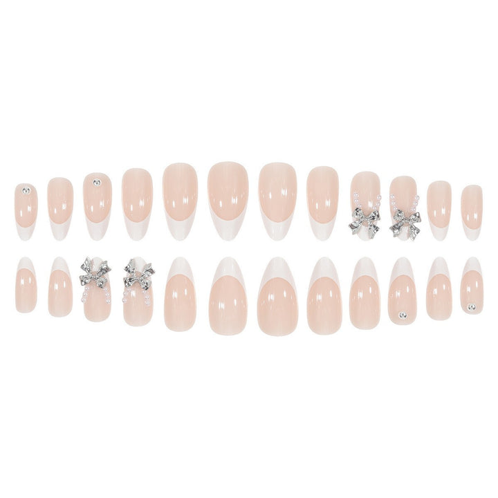 Glamorous artificial nail tips with elegant decorations Stornfield