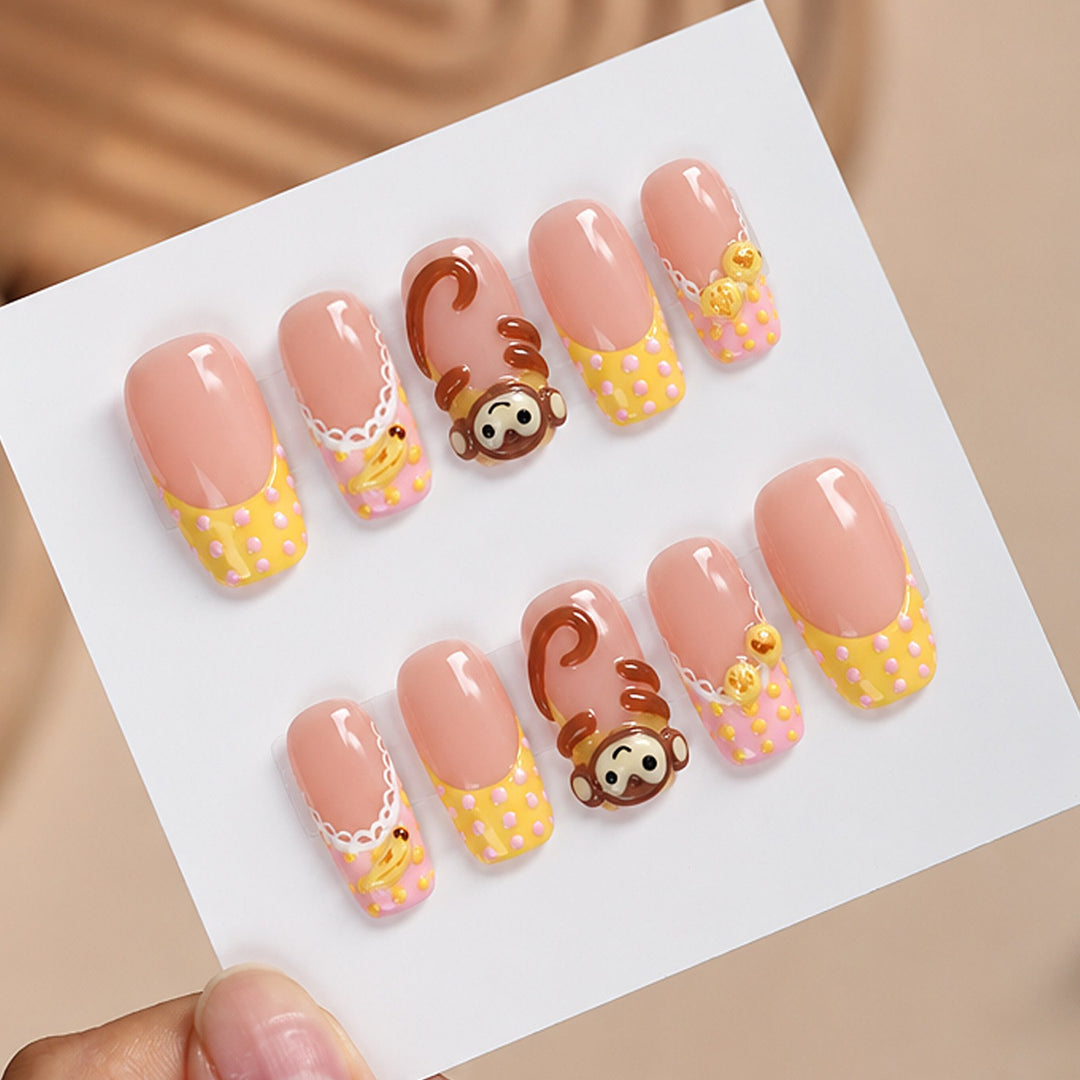 Artificial nail set with playful animal motifs and elegant embellishments Stornfield