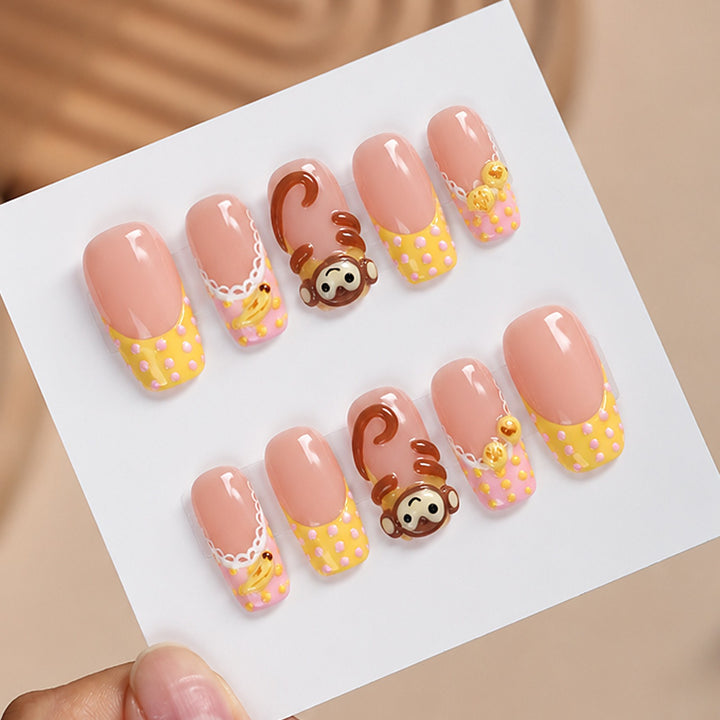 Artificial nail set with playful animal motifs and elegant embellishments Stornfield