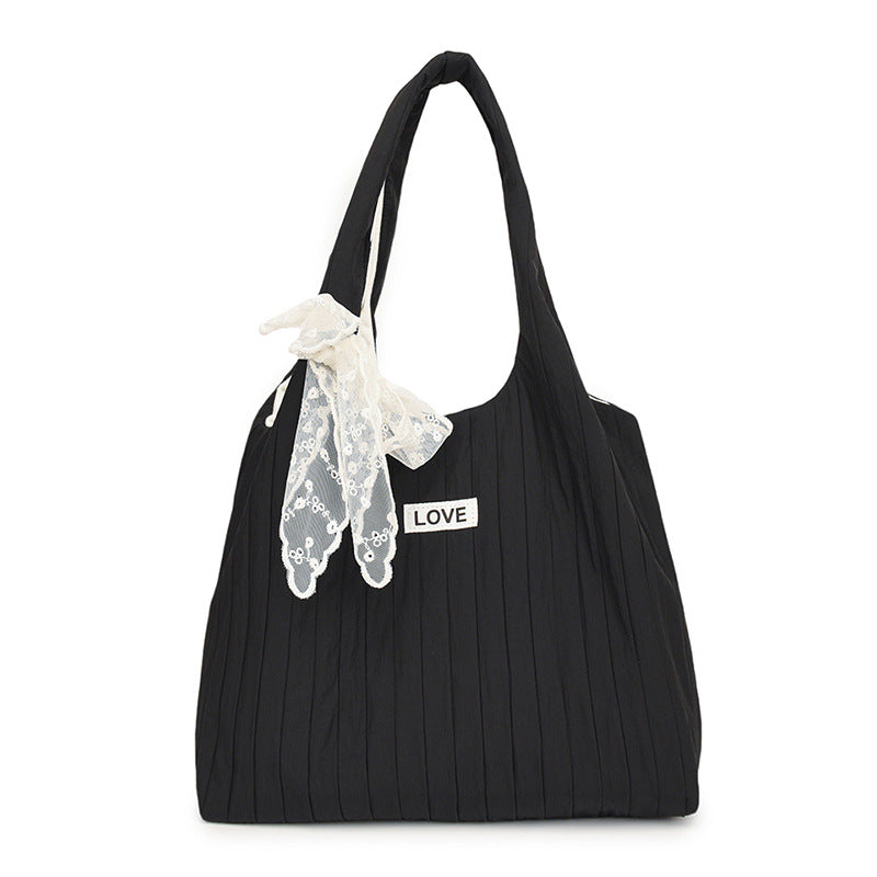 Leisure bag with structured design and playful scarf Stornfield