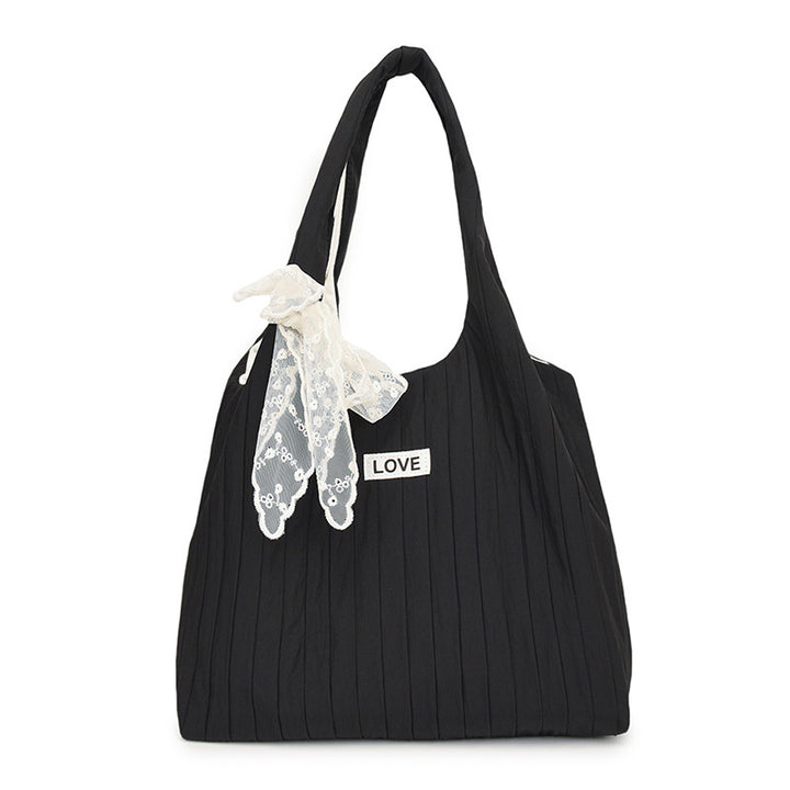 Leisure bag with structured design and playful scarf Stornfield