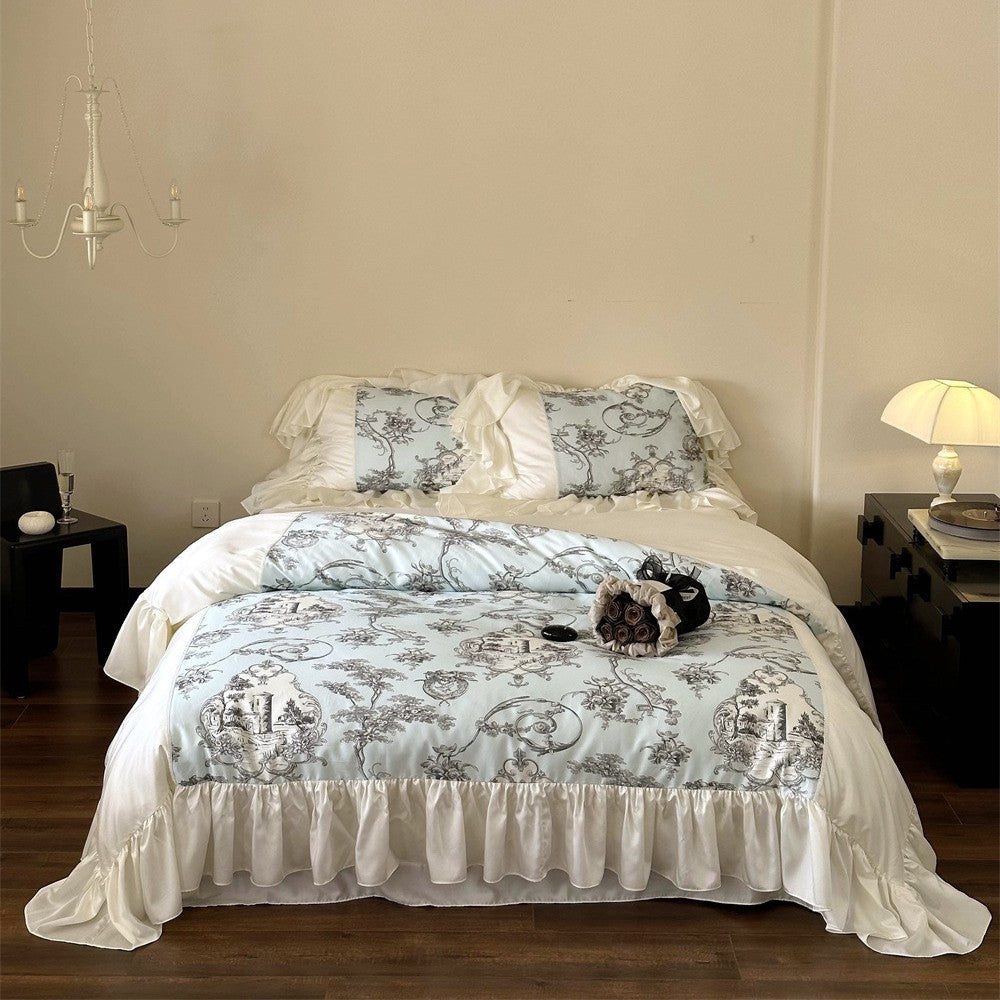 Romantic satin bedding set with ruffles, frills, and classic toile motif