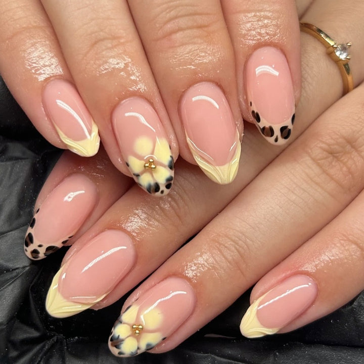 Artistic Press-On Nail Set with Floral Embellishments