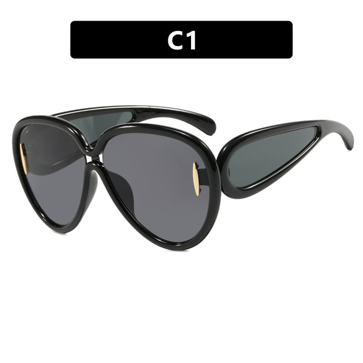 Women extravagant sunglasses in creative design Stornfield