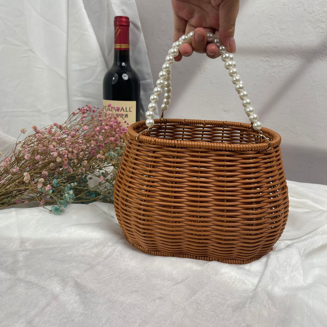 Women's stylish rattan container with pearl handle Stornfield