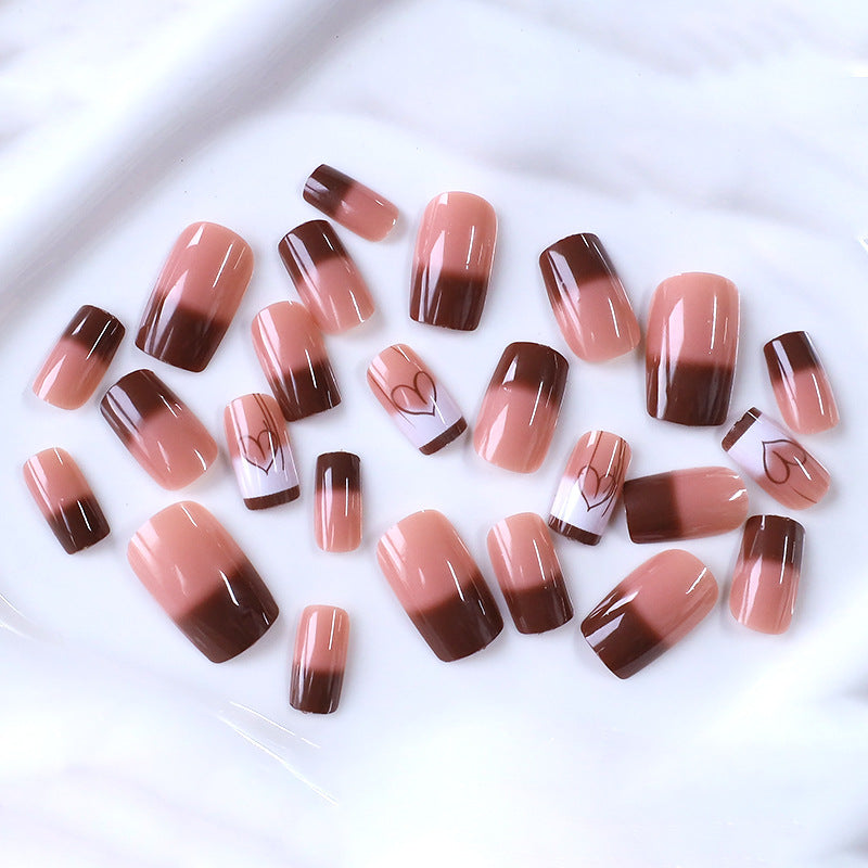 Artistic Heart-Embellished Nail Design Stornfield