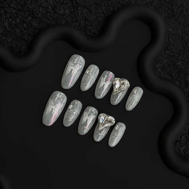 Artistic Press-On Nail Art Set with Butterfly Design and Gem Accents