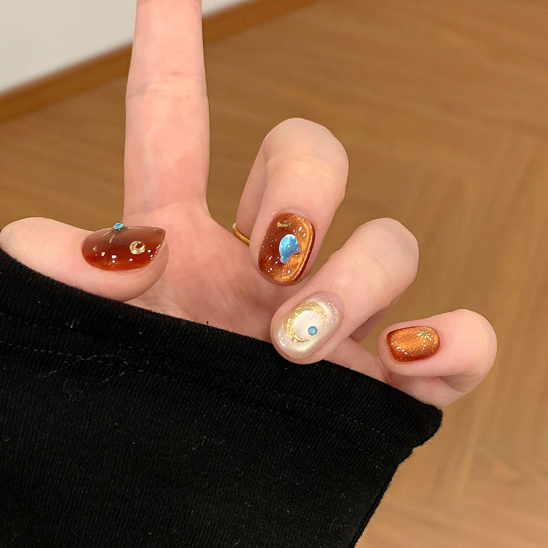 Artificial nails with glamorous metallic effect Stornfield