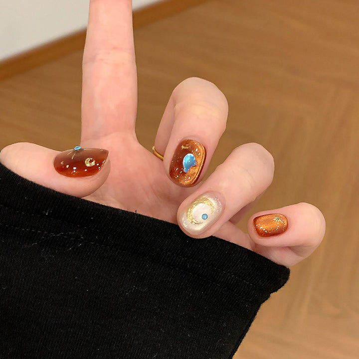 Artificial nails with glamorous metallic effect Stornfield
