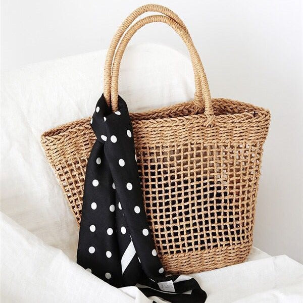 Elegant basket bag with stylish weaving and fashionable scarf Stornfield