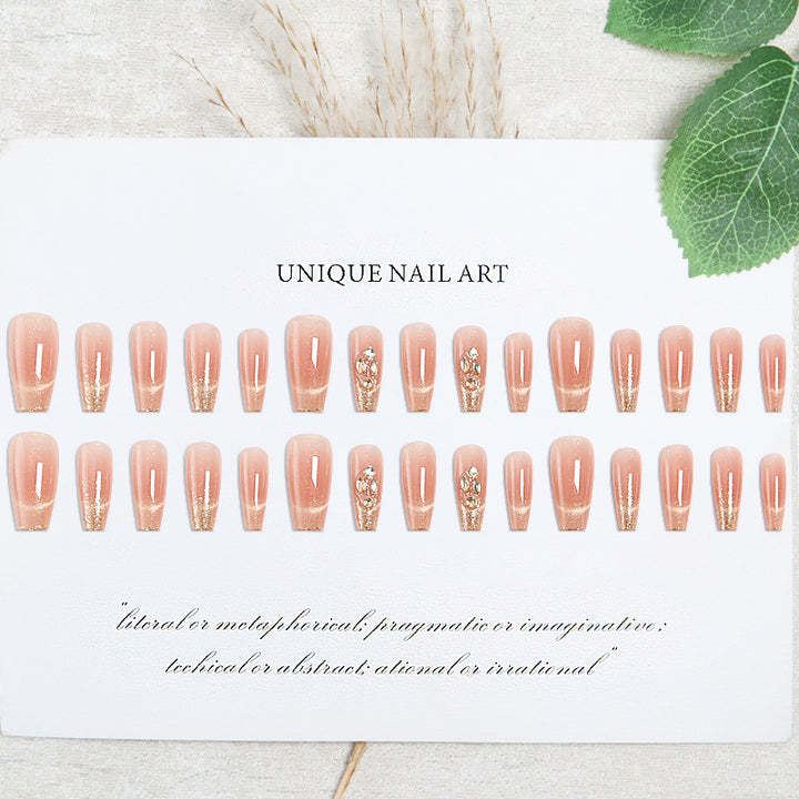 Artificial nail set with sparkling glitter and 3D applications Stornfield