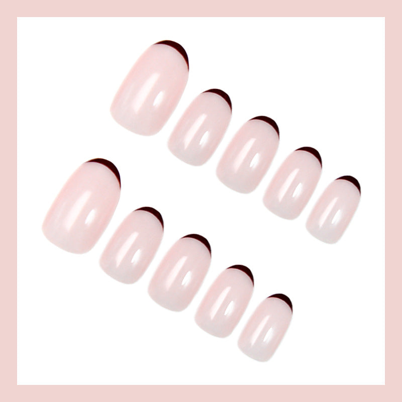 Artificial nail set with elegant French tips and trendy design Stornfield