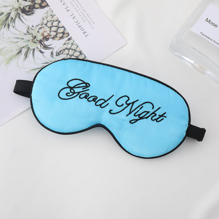 Unisex embroidered contoured sleep mask with decorative text embroidery and adjustable elastic band Stornfield