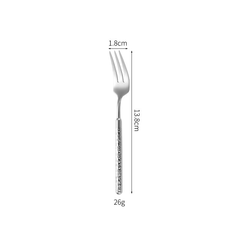 Elegant dessert spoon with elaborate handle design Stornfield