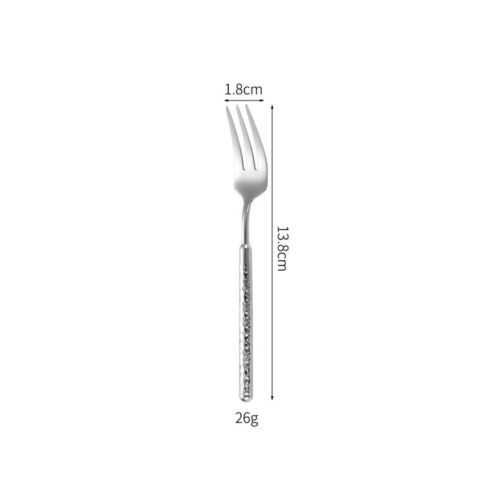 Elegant dessert spoon with elaborate handle design Stornfield