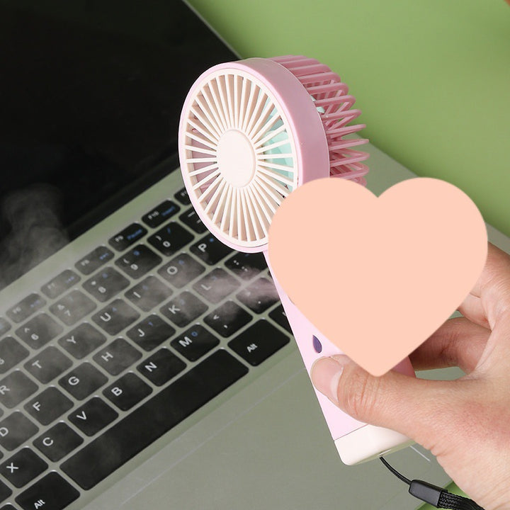 Cooling portable rechargeable handheld mini fan with adjustable airflow quiet motor and USB charging Stornfield