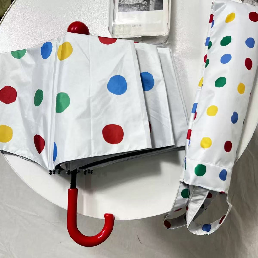 Ladies designer foldable umbrella with colorful polka dot pattern Stornfield