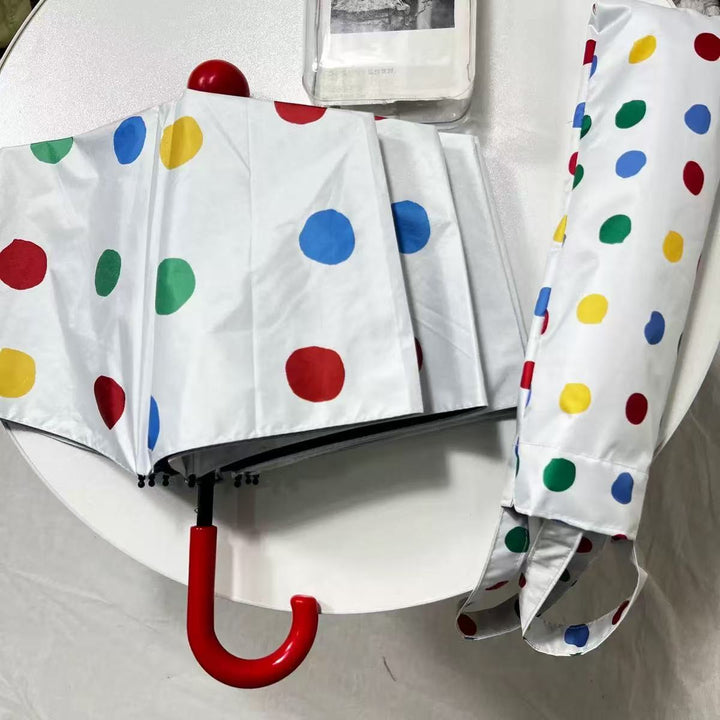 Ladies designer foldable umbrella with colorful polka dot pattern Stornfield